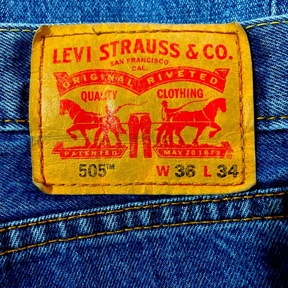 Levi’s tall 505s.